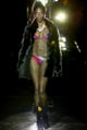 Black sheepskin short coat and red/black print triangle bikini