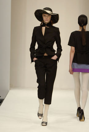Gold fine liquid jersey pleated Grecian dress, brown leather biker jacket and tan nappa leather trench belt   