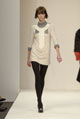 Black fine knit high neck top and mauve grey plain silk tulip skirt 