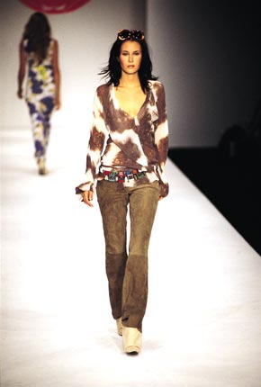 Muslin frill top, suede fitted pants and African multi-coloured beaded belt