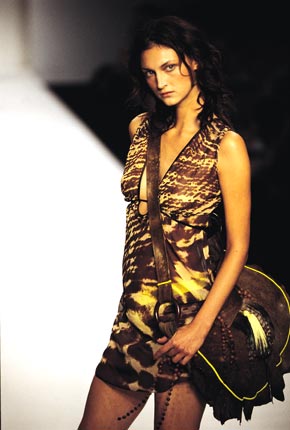Animal print princess-line mini dress and large suede bag with fluorescent piping