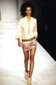 Fringed silk jacket. Beaded embroidery mini skirt. Leather printed African beaded belt