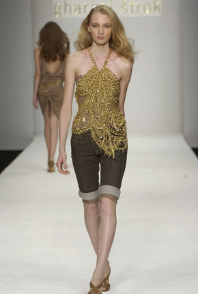 Gold chain halter top (Scott Wilson for Gharani Strok) and cocoa denim knee-length shorts 