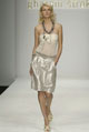 Cream circle fine knit tank top w/ sash and silver cotton lurex loose pleat skirt  